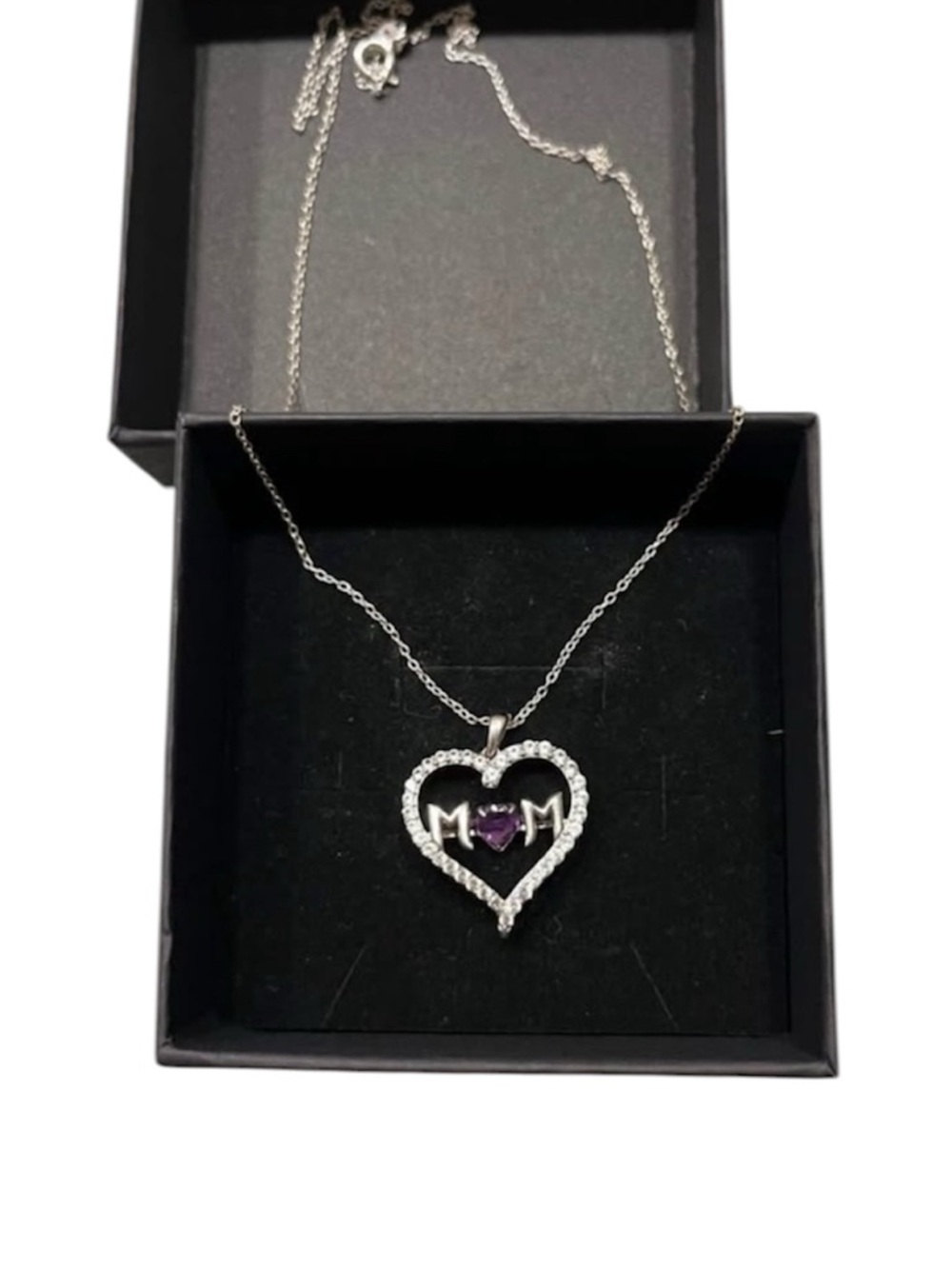 Sterling Silver “MOM” heart & purple crystal necklace
Perfect gift for Mom!